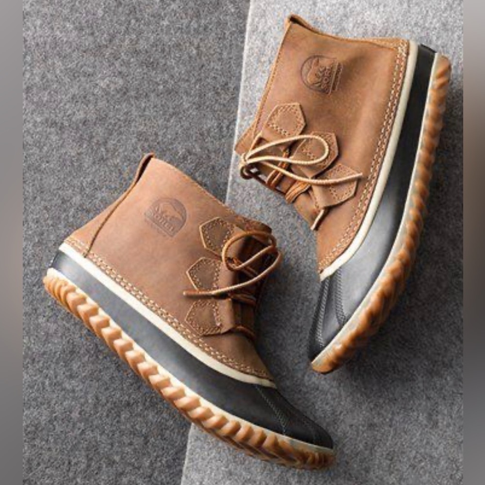 Sorel Tan and Black Winter Boots